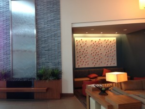 Lobby with water wall and seating area